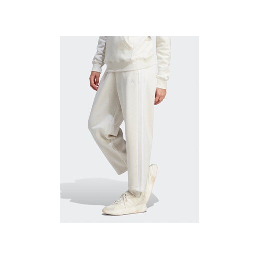 adidas Spodnie dresowe Essentials 3-Stripes Open Hem Fleece IM0248 Écru Loose L okazyjna cena MODIVO