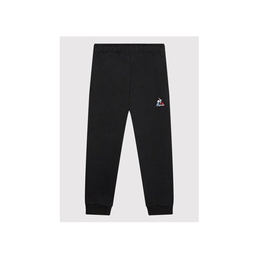 Le Coq Sportif Spodnie dresowe 2210490 Czarny Slim Fit ze sklepu MODIVO w kategorii Spodnie chłopięce - zdjęcie 168640125