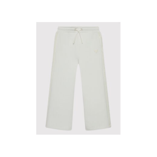 Guess Spodnie dresowe J2YQ26 FL03S Biały Regular Fit ze sklepu MODIVO w kategorii Spodnie dziewczęce - zdjęcie 168641419