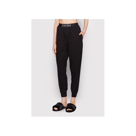 Calvin Klein Underwear Spodnie dresowe 000QS6802E Czarny Regular Fit ze sklepu MODIVO w kategorii Spodnie damskie - zdjęcie 168644906