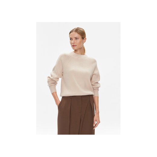 Calvin Klein Sweter Essential K20K206020 Beżowy Regular Fit ze sklepu MODIVO w kategorii Swetry damskie - zdjęcie 168650239