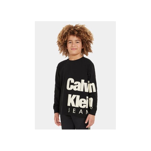 Calvin Klein Jeans Bluzka Blown Up Logo IB0IB01880 Czarny Regular Fit ze sklepu MODIVO w kategorii T-shirty chłopięce - zdjęcie 168653337