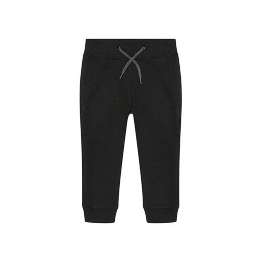 NAME IT Spodnie dresowe Solid Coloured 13153684 Czarny Regular Fit ze sklepu MODIVO w kategorii Spodnie chłopięce - zdjęcie 168655056