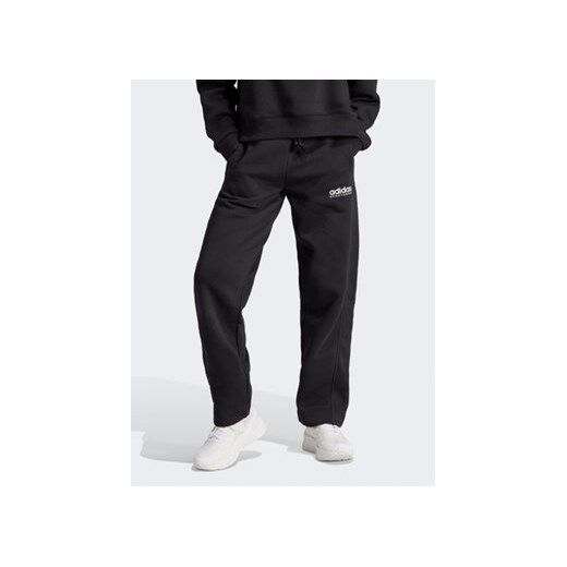 adidas Spodnie dresowe All SZN Fleece Graphic HZ5802 Czarny Loose Fit ze sklepu MODIVO w kategorii Spodnie damskie - zdjęcie 168655647