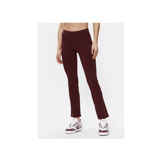 Skechers Spodnie dresowe Go Walk W03PT20B Bordowy Flared Leg ze sklepu MODIVO w kategorii Spodnie damskie - zdjęcie 168657787
