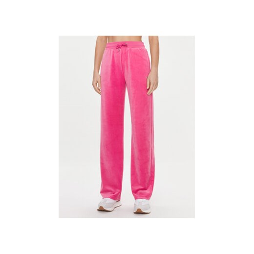 Guess Spodnie dresowe Couture V3BB26 KBXI2 Różowy Regular Fit ze sklepu MODIVO w kategorii Spodnie damskie - zdjęcie 168663545