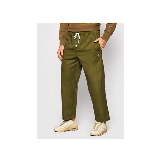 Champion Spodnie materiałowe 216544 Zielony Regular Fit ze sklepu MODIVO w kategorii Spodnie męskie - zdjęcie 168676268