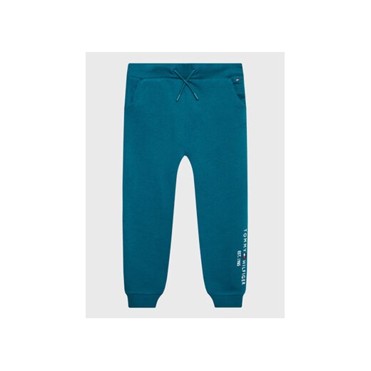 Tommy Hilfiger Spodnie dresowe Essential KG0KG06598 Zielony Slim Fit ze sklepu MODIVO w kategorii Spodnie chłopięce - zdjęcie 168677755
