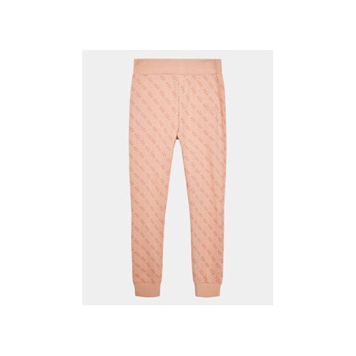 Guess Spodnie dresowe J3YQ19 KA6R3 Różowy Regular Fit ze sklepu MODIVO w kategorii Spodnie dziewczęce - zdjęcie 168680805