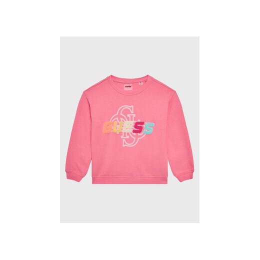 Guess Bluza J3GQ08 FL04P Różowy Regular Fit ze sklepu MODIVO w kategorii Bluzy dziewczęce - zdjęcie 168683169