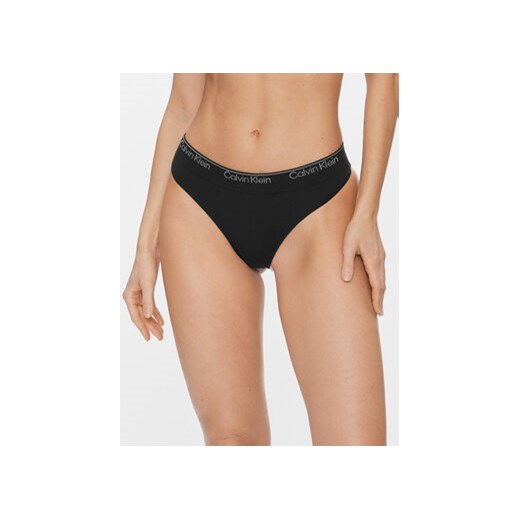 Calvin Klein Underwear Stringi Thong 000QF7095E Czarny ze sklepu MODIVO w kategorii Majtki damskie - zdjęcie 168693469