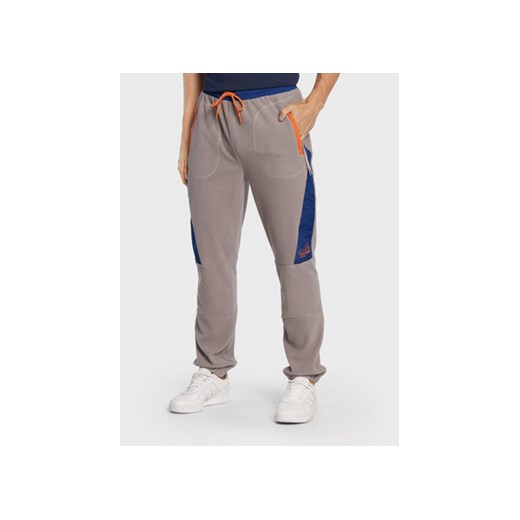 Ellesse Spodnie dresowe Cartario SHP16123 Szary Regular Fit ze sklepu MODIVO w kategorii Spodnie męskie - zdjęcie 168695185