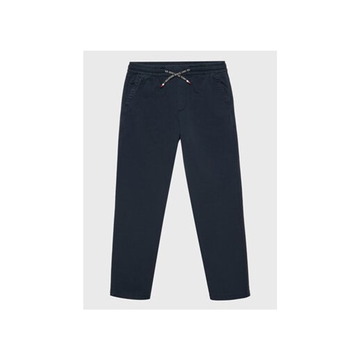 Tommy Hilfiger Spodnie materiałowe KB0KB07980 D Granatowy Tapered Fit ze sklepu MODIVO w kategorii Spodnie chłopięce - zdjęcie 168698128