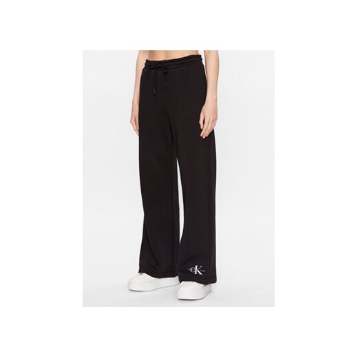 Calvin Klein Jeans Spodnie dresowe J20J221296 Czarny Relaxed Fit ze sklepu MODIVO w kategorii Spodnie damskie - zdjęcie 168698179