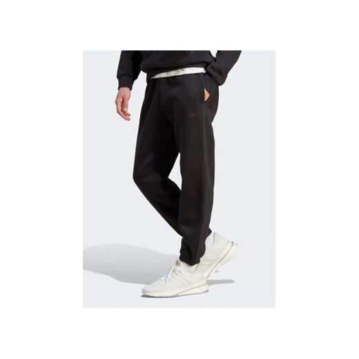 adidas Spodnie dresowe All SZN Fleece IB4048 Czarny Regular Fit ze sklepu MODIVO w kategorii Spodnie męskie - zdjęcie 168734825