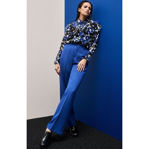 Spodnie w kant z szerokimi nogawkami niebieskie 4302, Kolor niebieski, Rozmiar XS, Moodo ze sklepu Primodo w kategorii Spodnie damskie - zdjęcie 168755125