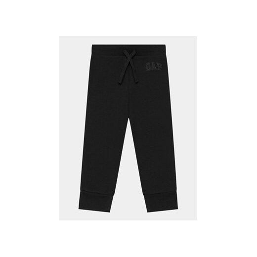 Gap Spodnie dresowe 715360-03 Czarny Regular Fit ze sklepu MODIVO w kategorii Spodnie chłopięce - zdjęcie 168794516