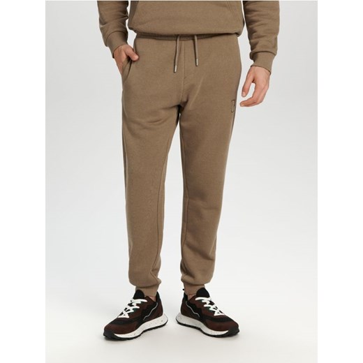 Sinsay - Spodnie dresowe - brązowy ze sklepu Sinsay w kategorii Spodnie męskie - zdjęcie 168798416