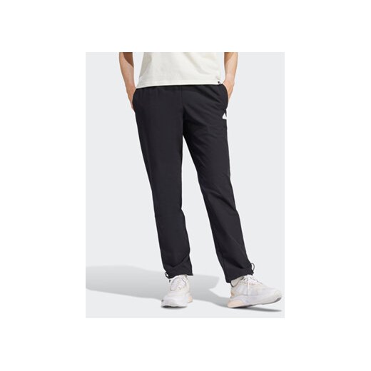 adidas Spodnie dresowe City Escape IT8814 Czarny Regular Fit ze sklepu MODIVO w kategorii Spodnie męskie - zdjęcie 168839906