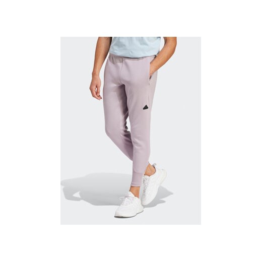 adidas Spodnie dresowe Z.N.E. Premium IR5214 Fioletowy Regular Fit ze sklepu MODIVO w kategorii Spodnie męskie - zdjęcie 168855175