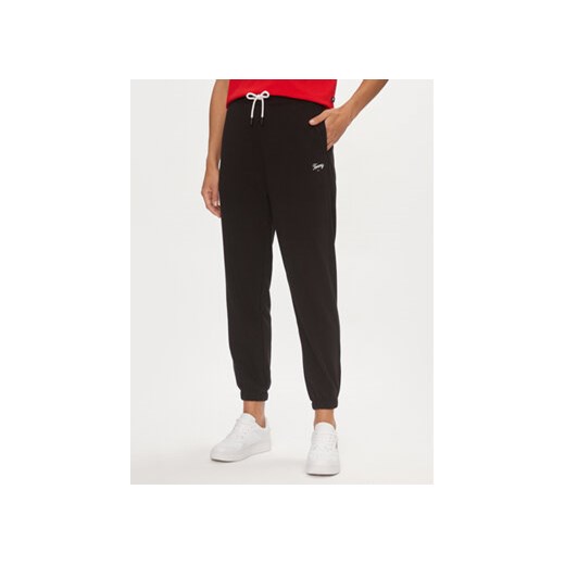 Tommy Jeans Spodnie dresowe Script DW0DW17771 Czarny Relaxed Fit ze sklepu MODIVO w kategorii Spodnie damskie - zdjęcie 169015517