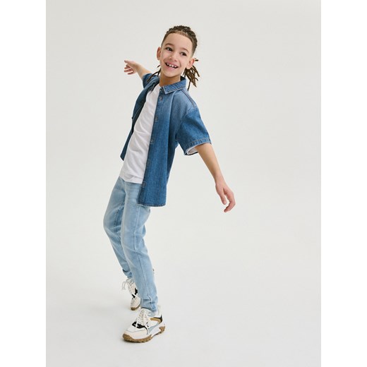 Reserved - Elastyczne jeansy slim - niebieski ze sklepu Reserved w kategorii Spodnie chłopięce - zdjęcie 169092237