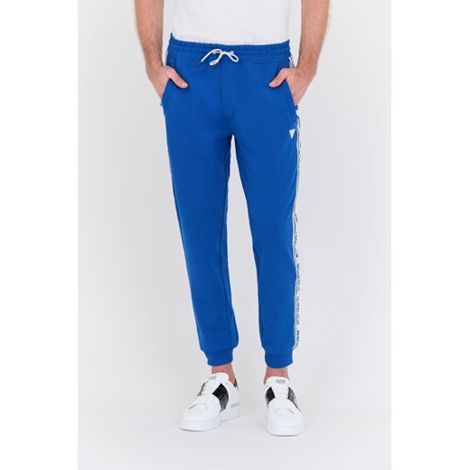 GUESS Niebieskie spodnie dresowe New Arlo Long Pant, Wybierz rozmiar XL ze sklepu outfit.pl w kategorii Spodnie męskie - zdjęcie 169097967