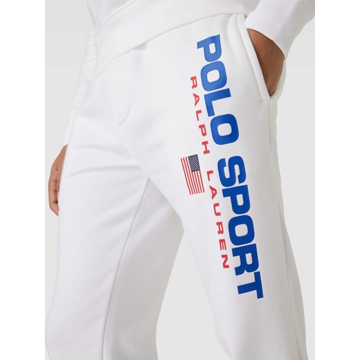 Białe spodnie męskie Polo Sport dresowe 