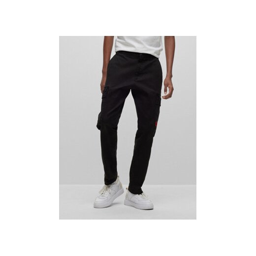 Hugo Spodnie materiałowe 50484022 Czarny Slim Fit ze sklepu MODIVO w kategorii Spodnie męskie - zdjęcie 169286476