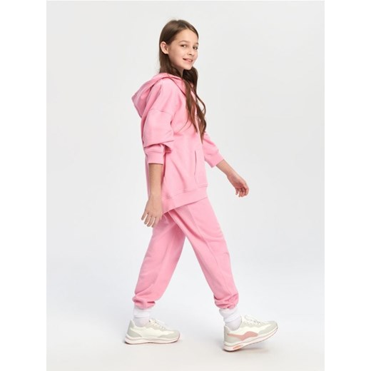 Sinsay - Spodnie dresowe - różowy ze sklepu Sinsay w kategorii Spodnie dziewczęce - zdjęcie 169322525