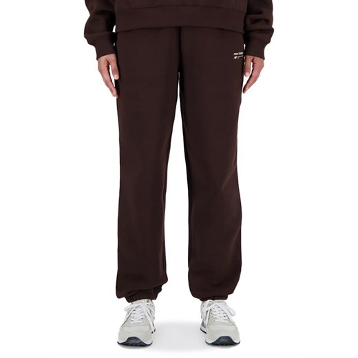 Spodnie New Balance WP33513KCF - brązowe ze sklepu streetstyle24.pl w kategorii Spodnie damskie - zdjęcie 169343576