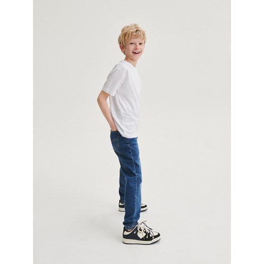 Reserved - Elastyczne jeansy carrot - niebieski ze sklepu Reserved w kategorii Spodnie chłopięce - zdjęcie 169424356