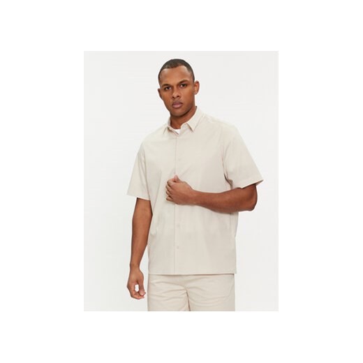 Calvin Klein Koszula K10K109440 Beżowy Regular Fit ze sklepu MODIVO w kategorii Koszule męskie - zdjęcie 169450286