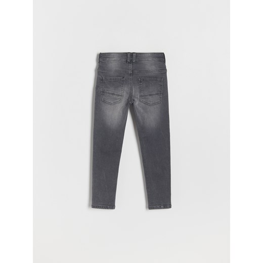 Reserved - Jeansy slim z efektem sprania - szary ze sklepu Reserved w kategorii Spodnie chłopięce - zdjęcie 169457996