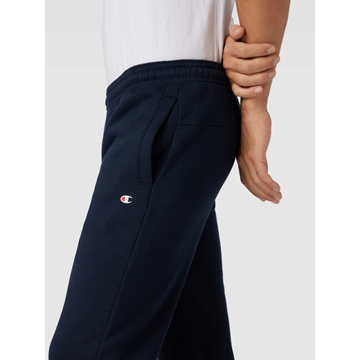 Spodnie dresowe o kroju regular fit z elastycznym pasem Champion S Peek&Cloppenburg 