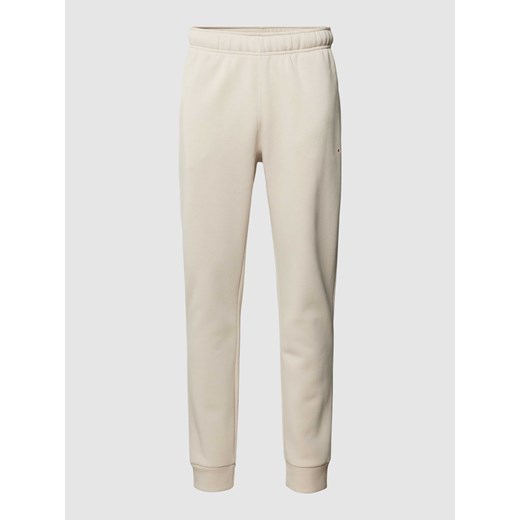 Spodnie dresowe o kroju regular fit z elastycznym pasem ze sklepu Peek&Cloppenburg  w kategorii Spodnie męskie - zdjęcie 169460845