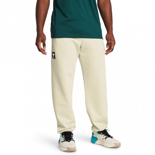 Męskie spodnie treningowe Under Armour Project Rock Hwt Terry Jgr - kremowe ze sklepu Sportstylestory.com w kategorii Spodnie męskie - zdjęcie 169521986