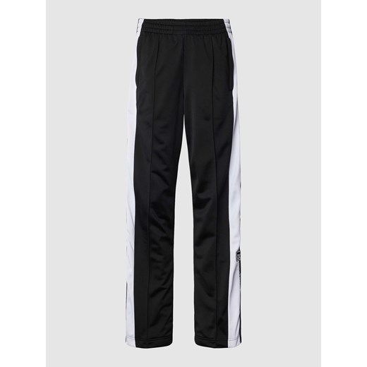 Spodnie dresowe z bocznymi listwami na zatrzaski model ‘ADIBREAK’ ze sklepu Peek&Cloppenburg  w kategorii Spodnie damskie - zdjęcie 169558296