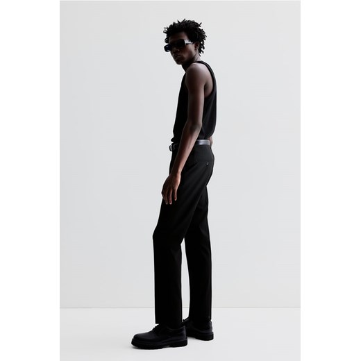 H & M - Spodnie Slim Fit - Czarny ze sklepu H&M w kategorii Spodnie męskie - zdjęcie 169593785