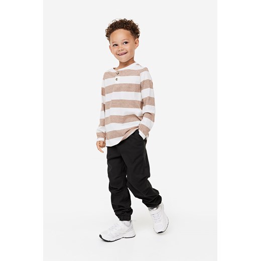 H & M - Joggersy z diagonalu - Czarny ze sklepu H&M w kategorii Spodnie chłopięce - zdjęcie 169675187