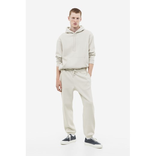 H & M - Spodnie dresowe Relaxed Fit - Brązowy H & M L H&M