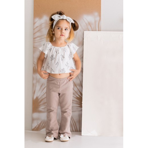 Bawełniana bluzka dziewczęca z motywem roślinnym ze sklepu 5.10.15 w kategorii Bluzki dziewczęce - zdjęcie 169687626
