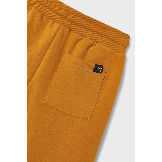 Pomarańczowe spodnie dresowe chłopięce Mayoral 116 promocyjna cena 5.10.15