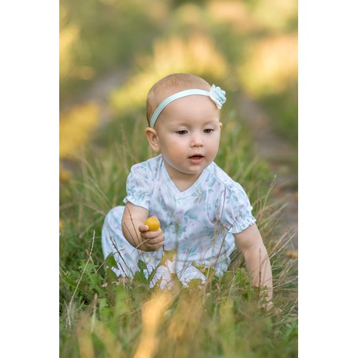 Bawełniany rampers niemowlęcy z motywem roślinnym ze sklepu 5.10.15 w kategorii Pajacyki - zdjęcie 169691657