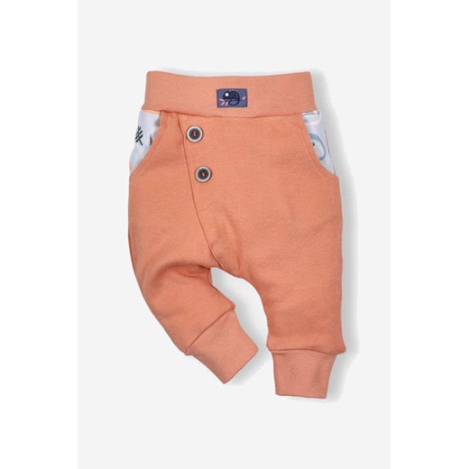 Pomarańczowe dwuwarstwowe spodnie z bawełny organicznej dla chłopca ze sklepu 5.10.15 w kategorii Spodnie i półśpiochy - zdjęcie 169692627