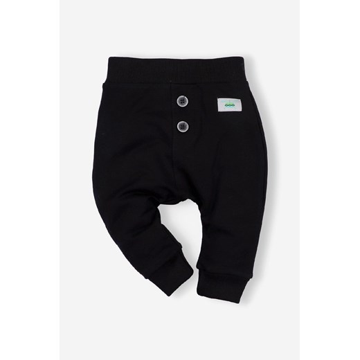 Czarne spodnie niemowlęce z bawełny organicznej dla chłopca ze sklepu 5.10.15 w kategorii Spodnie i półśpiochy - zdjęcie 169692838
