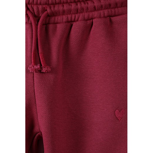 Bordowe spodnie dresowe dla dziewczynki Minoti 128/134 5.10.15