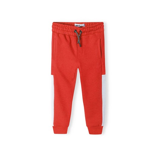 Czerwone spodnie dresowe niemowlęce z białymi paskami ze sklepu 5.10.15 w kategorii Spodnie i półśpiochy - zdjęcie 169695338
