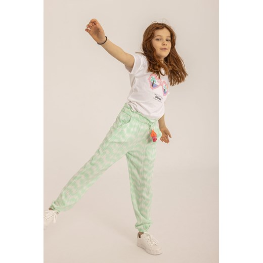 Luźne spodnie dziewczęce haremki zielone z wiskozy ze sklepu 5.10.15 w kategorii Spodnie dziewczęce - zdjęcie 169697467