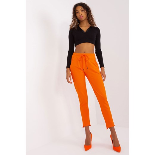 Spodnie basic z asymetrycznymi nogawkami pomarańczowy ze sklepu 5.10.15 w kategorii Spodnie damskie - zdjęcie 169701426